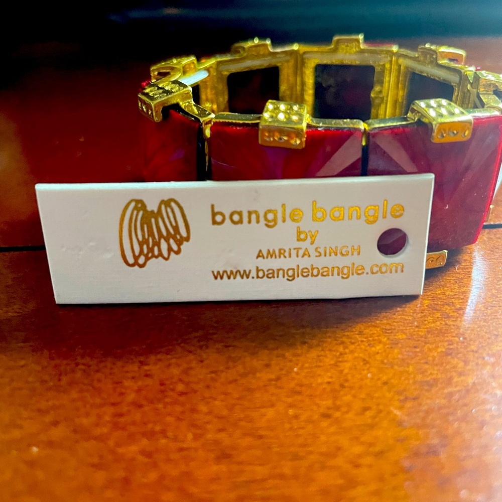Amrita Singh red bracelet